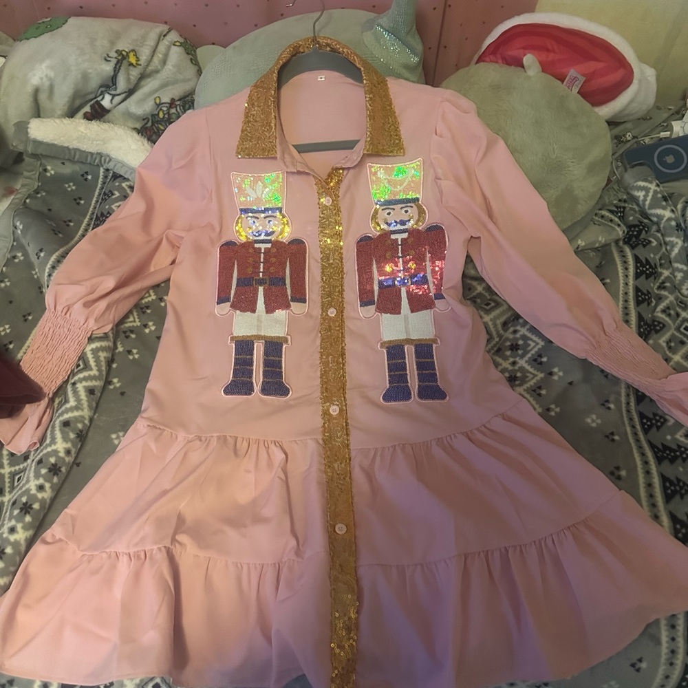 Small, light pink nutcracker Christmas dress, knee length